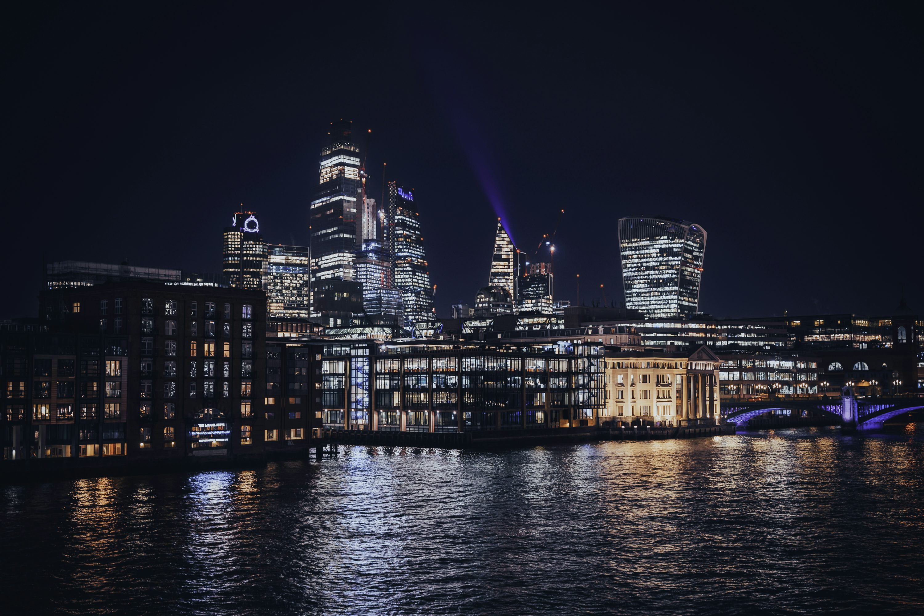 London skyline at dusk showing blend of historic and modern architecture